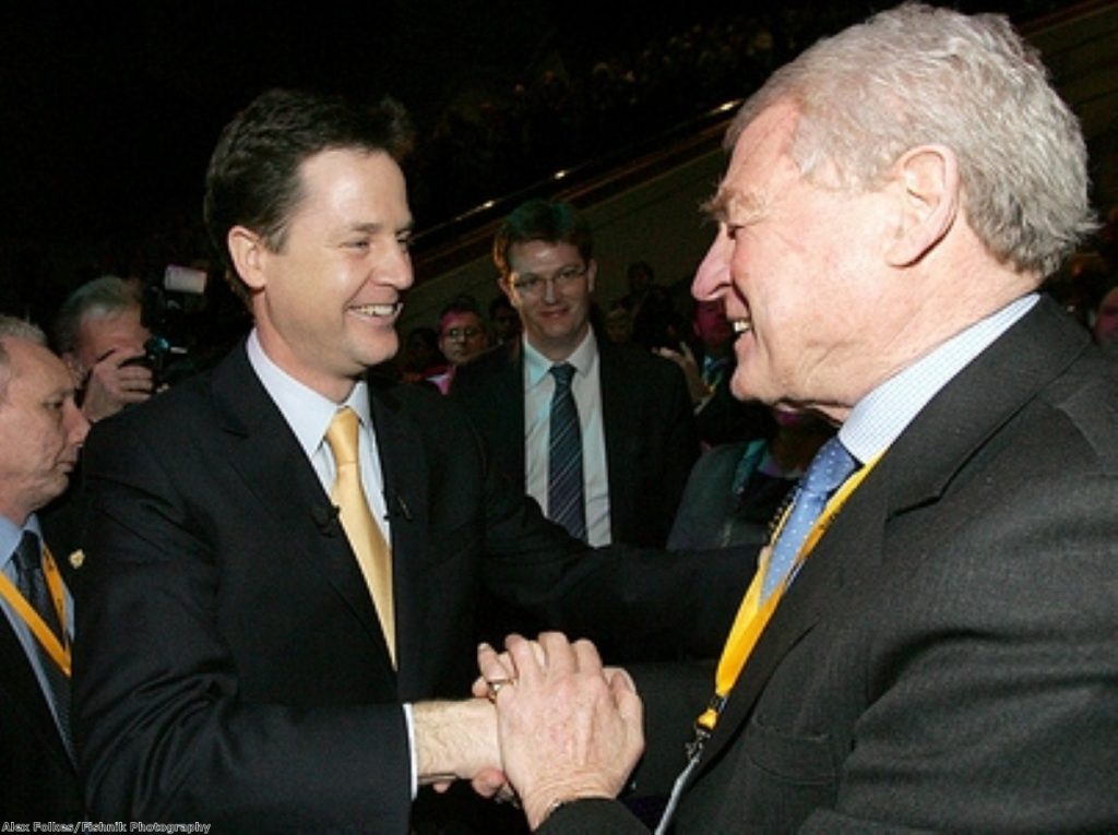 Paddy Ashdown (r) has rallied behind embattled party leader Nick Clegg