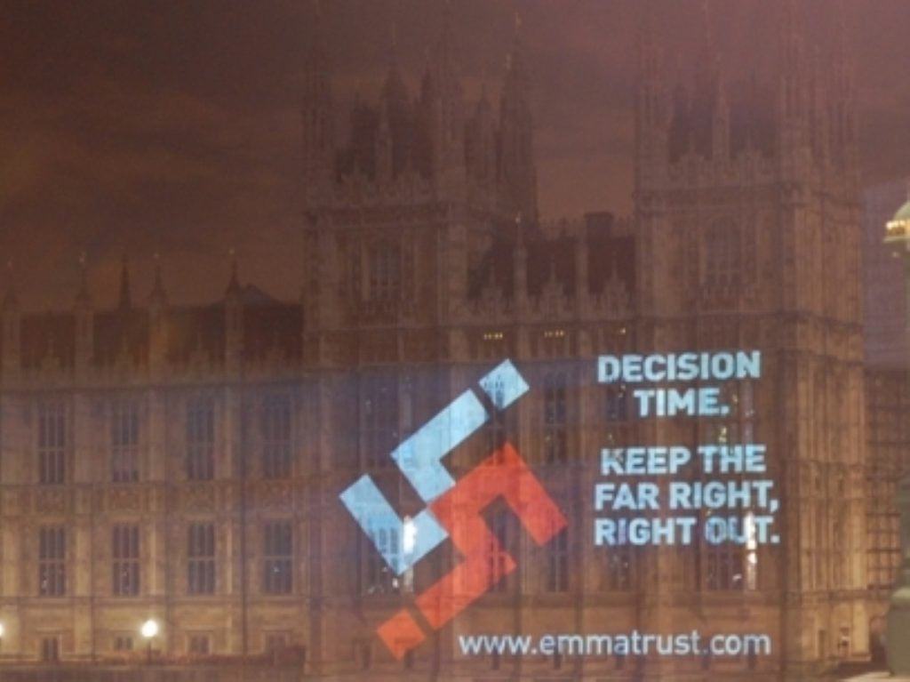 A swastika on the Houses of parliament in protest at the rise of the far right