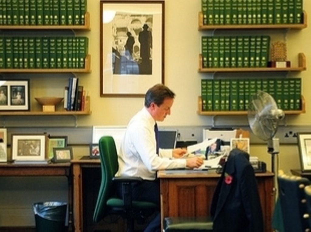 David Cameron in his parliamentary office. He'll be meeting the parliamentary party later today.