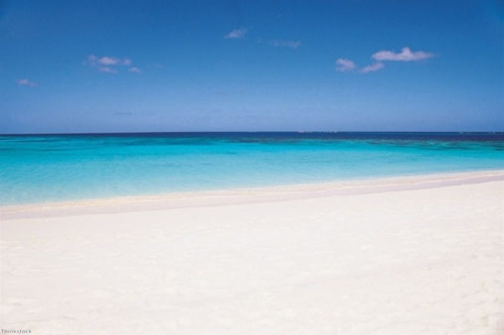An idyllic beach on Turks and Caicos, where billions of pounds pass through the Islands each year