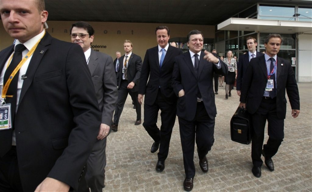 Cameron takes a walk with European Commission president Jose Manuel Barroso, who might be about to steal his dru policy powers.