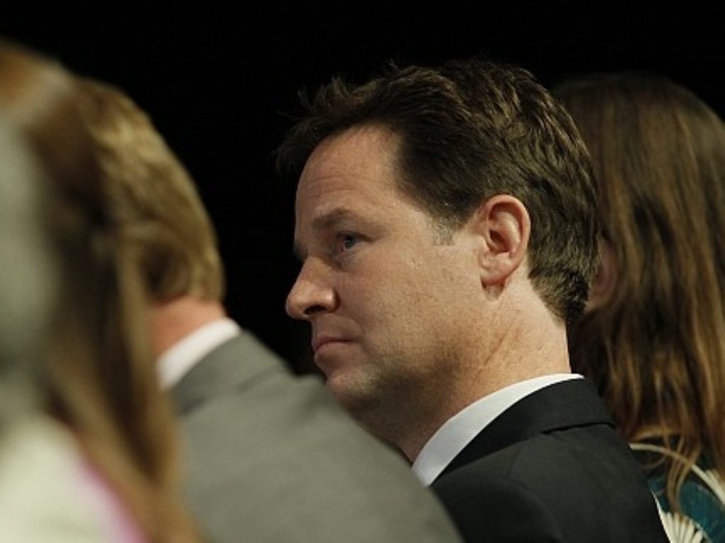Clegg watches proceedings at the Lib Dem conference. The party leadership will be troubled by the vote.