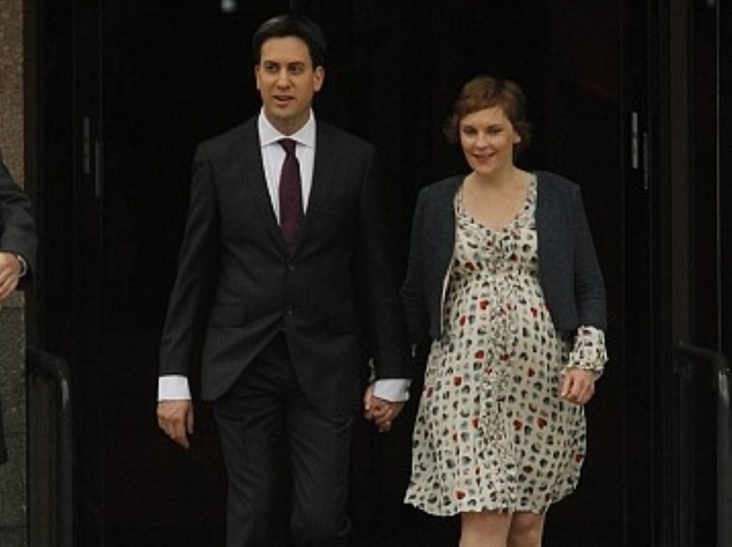 Ed Miliband arrives for his leader's speech with partner Justine Thornton