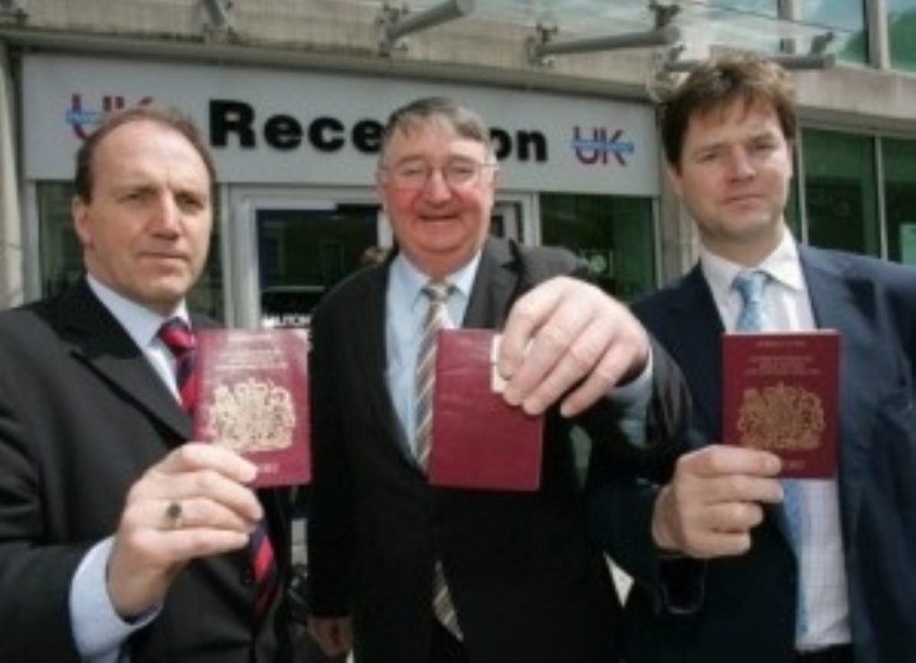 Simon Hughes, Roger Williams and Nick Clegg show their new passports